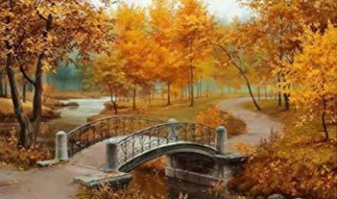 Building bridges to a better future. A small arched bridge spanning a creek in the Autumn season